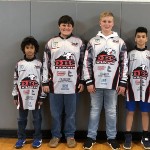 5 members of the fishing team in their new jerseys
