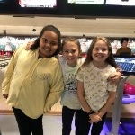 group of girls bowling