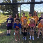 k & 1 students in a group college colors photo