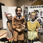 three students dressed as native Americans